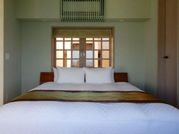 Imagen de la habitación del Hotel Kayatsuma Okinawa and Resort. Foto 31