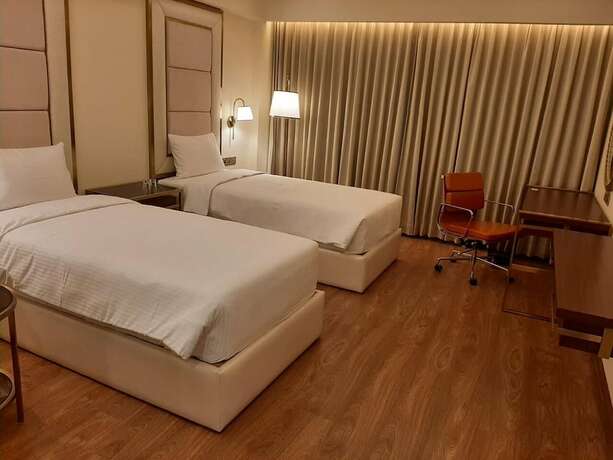 Imagen de la habitación del Hotel Kay-em Spectra Chennai. Foto 8