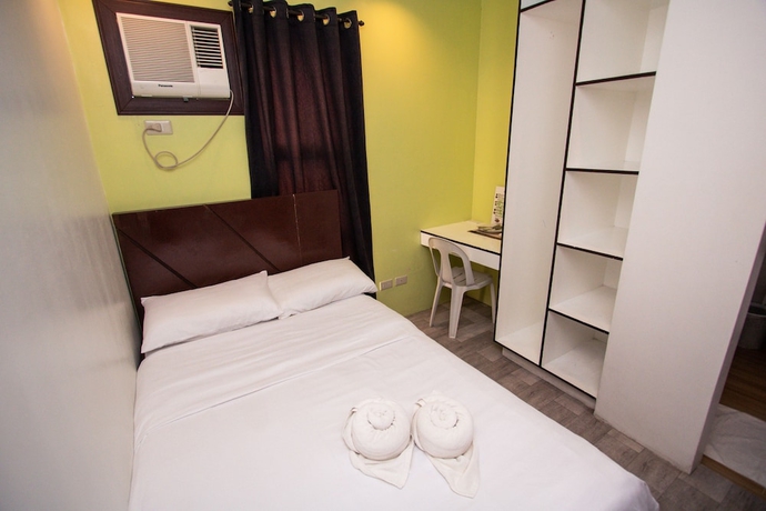 Imagen de la habitación del Hotel Kayong\'s Inn. Foto 2