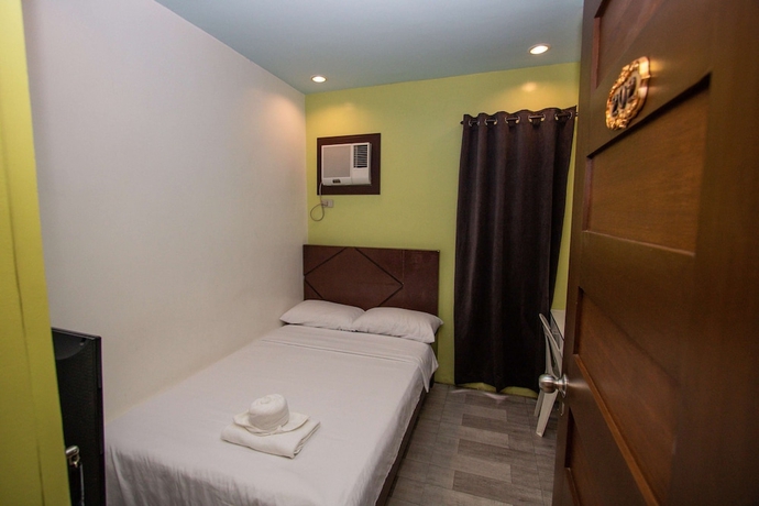 Imagen de la habitación del Hotel Kayong\'s Inn. Foto 3