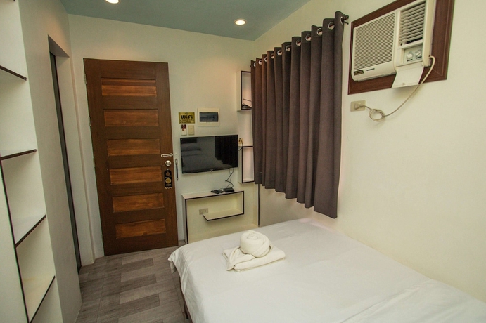 Imagen de la habitación del Hotel Kayong\'s Inn. Foto 8