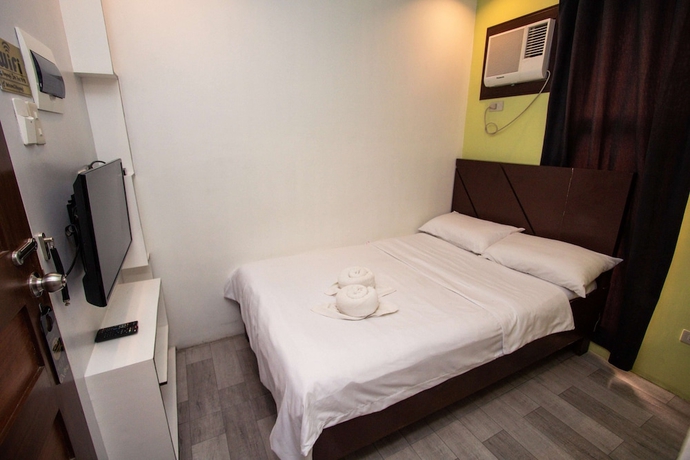 Imagen de la habitación del Hotel Kayong\'s Inn. Foto 9