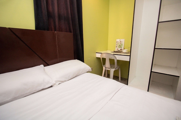 Imagen de la habitación del Hotel Kayong\'s Inn. Foto 10