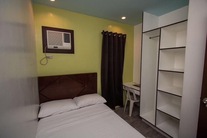 Imagen de la habitación del Hotel Kayong\'s Inn. Foto 11
