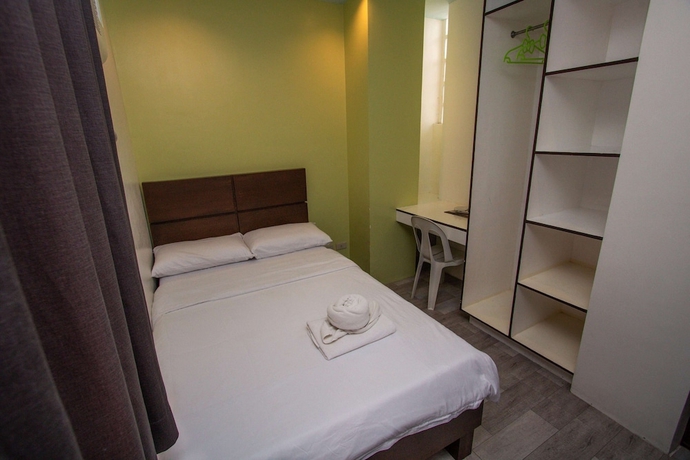 Imagen de la habitación del Hotel Kayong\'s Inn. Foto 12