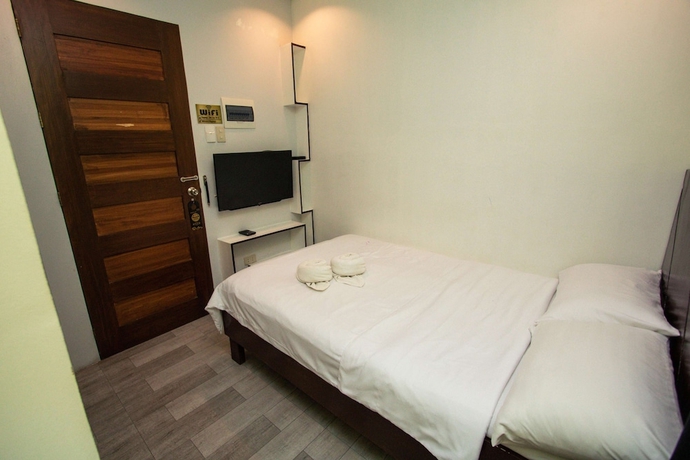 Imagen de la habitación del Hotel Kayong\'s Inn. Foto 13