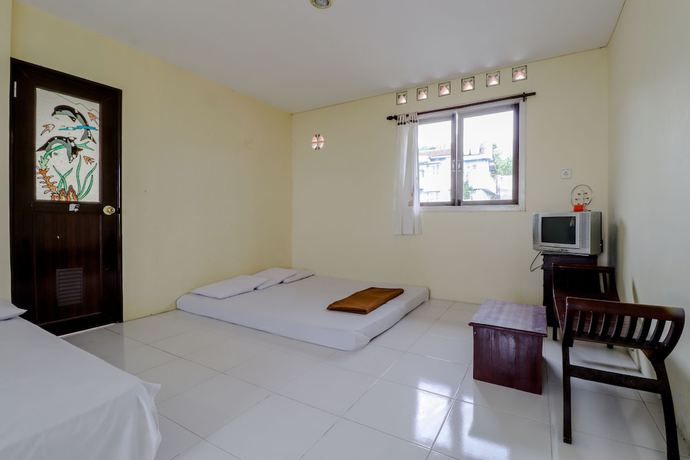 Imagen de la habitación del Hotel Kayu Manis. Foto 2
