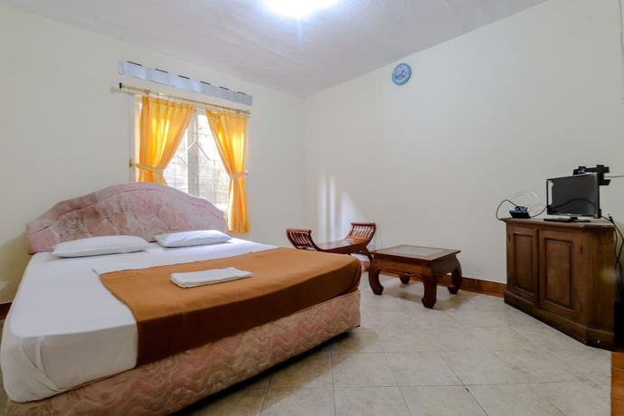 Imagen de la habitación del Hotel Kayu Manis. Foto 3