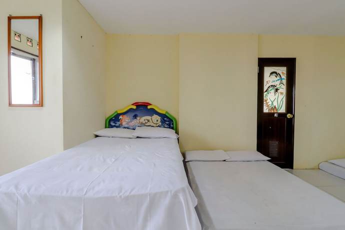 Imagen de la habitación del Hotel Kayu Manis. Foto 5