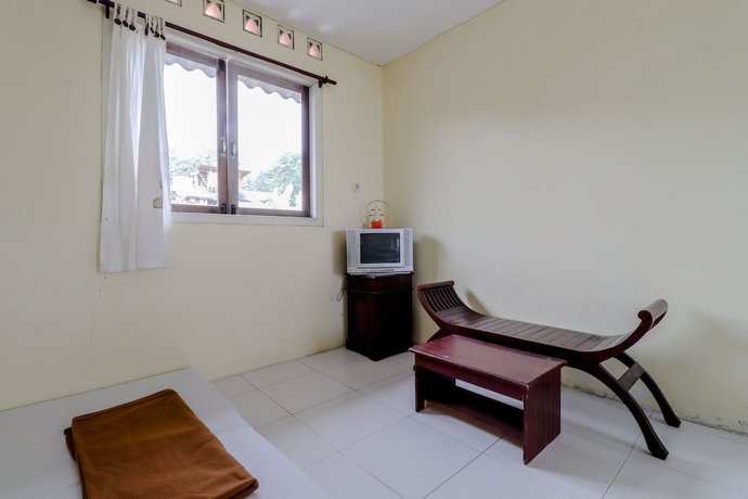 Imagen de la habitación del Hotel Kayu Manis. Foto 8