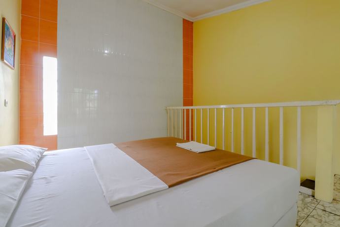 Imagen de la habitación del Hotel Kayu Manis. Foto 10
