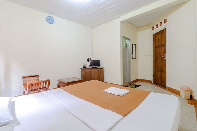 Imagen de la habitación del Hotel Kayu Manis. Foto 11