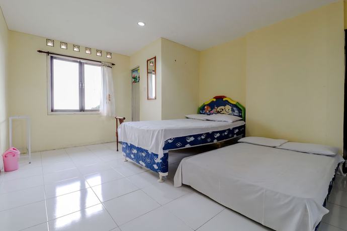 Imagen de la habitación del Hotel Kayu Manis. Foto 13