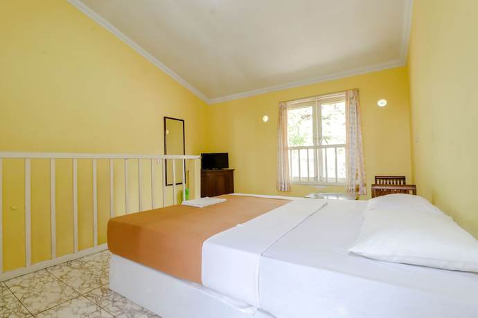 Imagen de la habitación del Hotel Kayu Manis. Foto 14