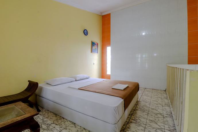 Imagen de la habitación del Hotel Kayu Manis. Foto 15