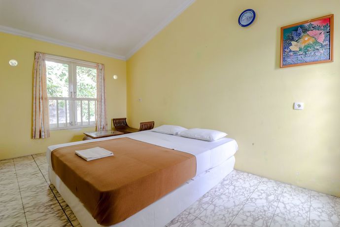 Imagen de la habitación del Hotel Kayu Manis. Foto 18