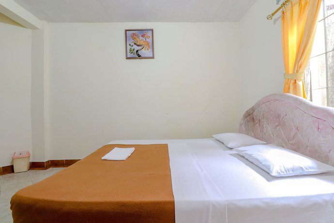 Imagen de la habitación del Hotel Kayu Manis. Foto 19