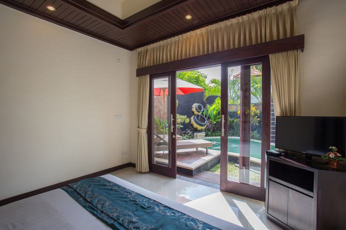 Imagen de la habitación del Hotel Kayu Suar Bali Luxury Villas and Spa. Foto 13