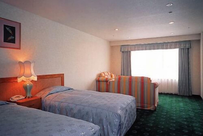 Imagen de la habitación del Hotel Kazokutosugosu Shirahamanoyado Yanagiya. Foto 3