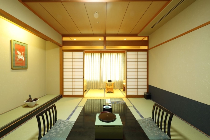 Imagen de la habitación del Hotel Kazokutosugosu Shirahamanoyado Yanagiya. Foto 4