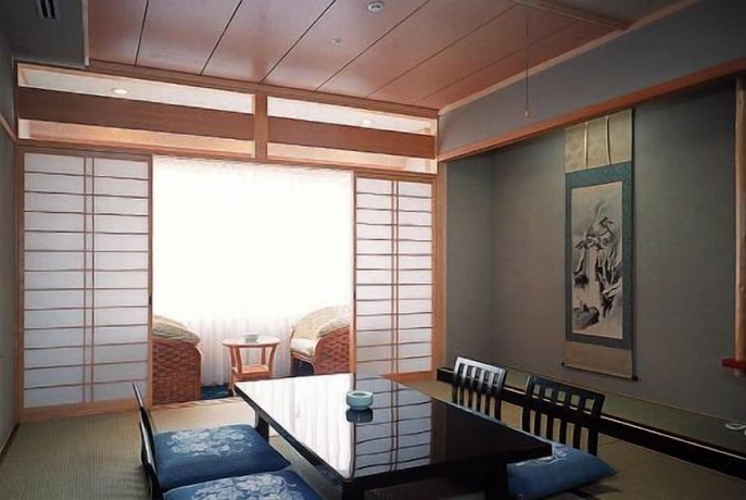 Imagen de la habitación del Hotel Kazokutosugosu Shirahamanoyado Yanagiya. Foto 5
