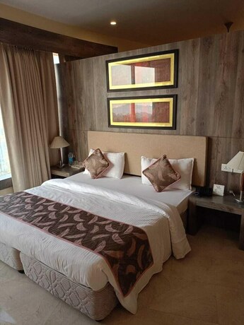 Imagen de la habitación del Hotel Kc Residency. Foto 18