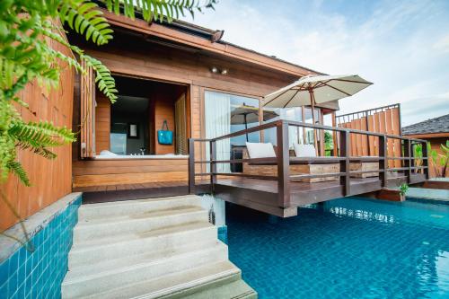 Imagen de la habitación del Hotel Kc Resort and Over Water Villas. Foto 6