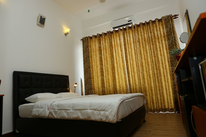 Imagen de la habitación del Hotel Kdu Guest House. Foto 6