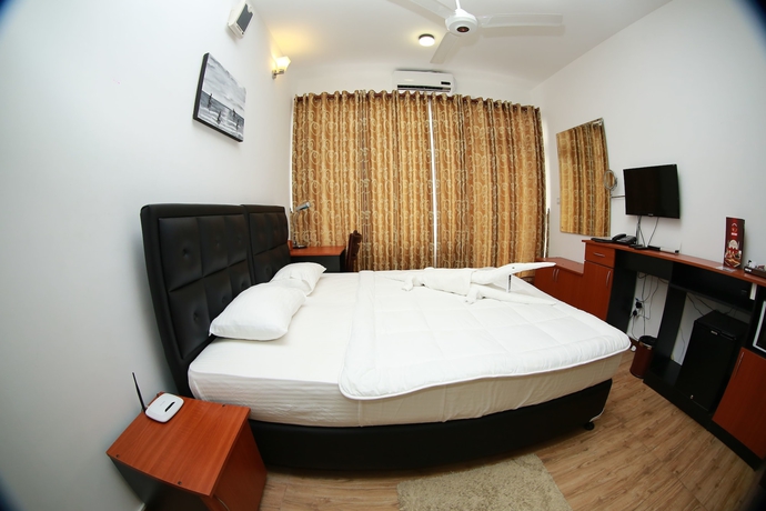 Imagen de la habitación del Hotel Kdu Guest House. Foto 7