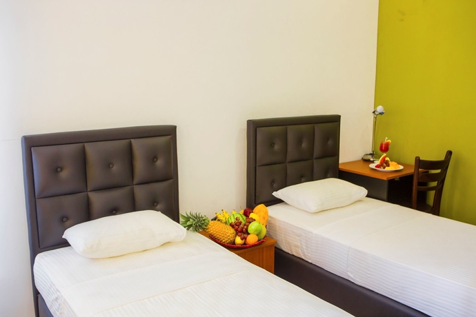 Imagen de la habitación del Hotel Kdu Guest House. Foto 11