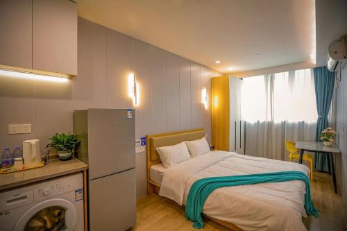 Imagen de la habitación del Hotel KeTangJian Aparthotel. Foto 17