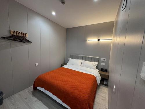 Imagen de la habitación del Hotel KeTangJian Aparthotel. Foto 20