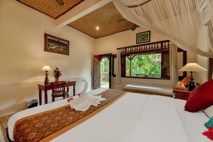 Imagen de la habitación del Hotel Kebun Indah. Foto 2