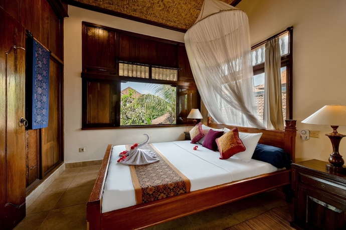 Imagen de la habitación del Hotel Kebun Indah. Foto 8