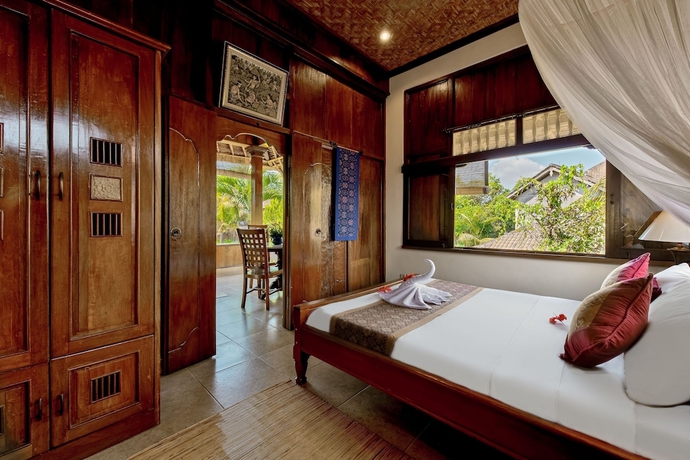 Imagen de la habitación del Hotel Kebun Indah. Foto 9