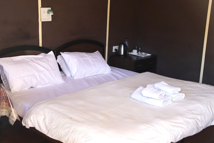 Imagen de la habitación del Hotel Kedar Heights Heli Resort. Foto 5