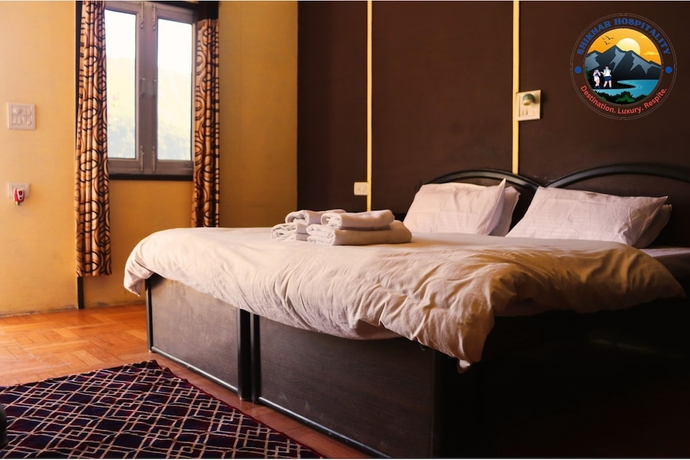 Imagen de la habitación del Hotel Kedar Heights Heli Resort. Foto 6