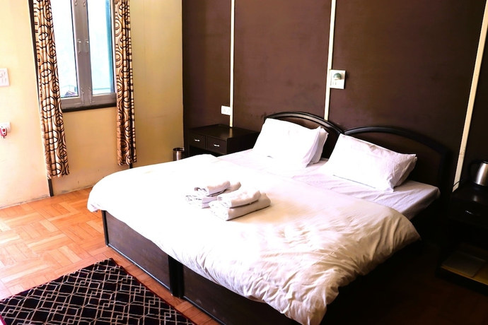 Imagen de la habitación del Hotel Kedar Heights Heli Resort. Foto 8