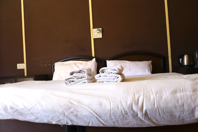 Imagen de la habitación del Hotel Kedar Heights Heli Resort. Foto 9