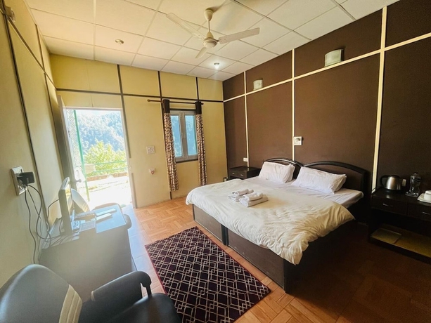 Imagen de la habitación del Hotel Kedar Heights Heli Resort. Foto 11