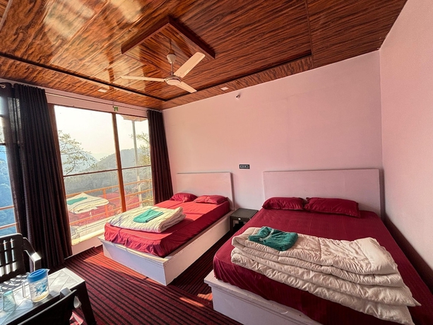 Imagen de la habitación del Hotel Kedar Hill Resort. Foto 9