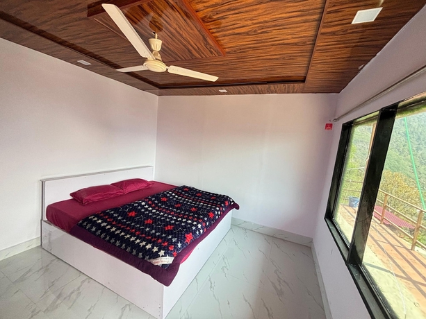 Imagen de la habitación del Hotel Kedar Hill Resort. Foto 11