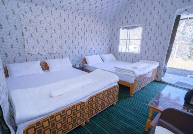 Imagen de la habitación del Hotel Kedarnath Eco Resort. Foto 11