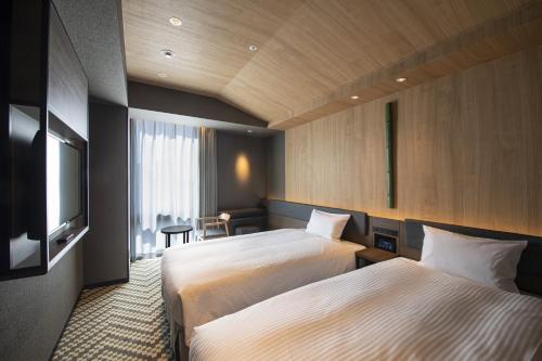 Imagen de la habitación del Hotel Keihan Tenmabashi Ekimae. Foto 15