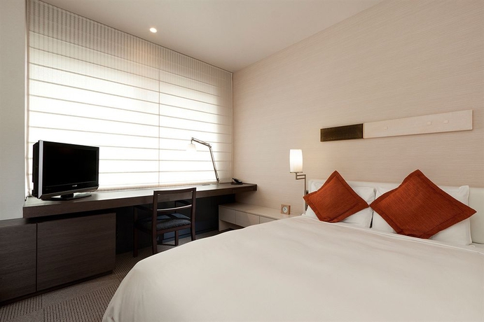 Imagen de la habitación del Hotel Keihan Tokyo Yotsuya. Foto 11