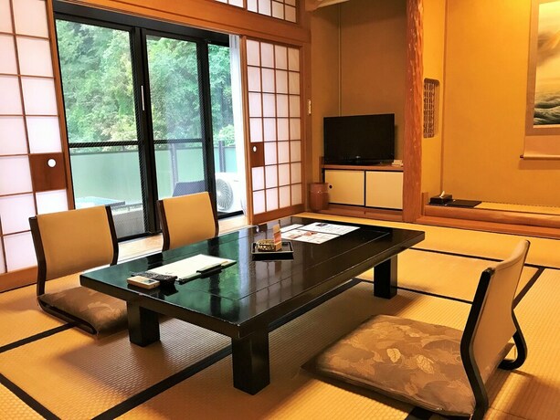 Imagen de la habitación del Hotel Keikoku Bettei Mochinoki. Foto 22