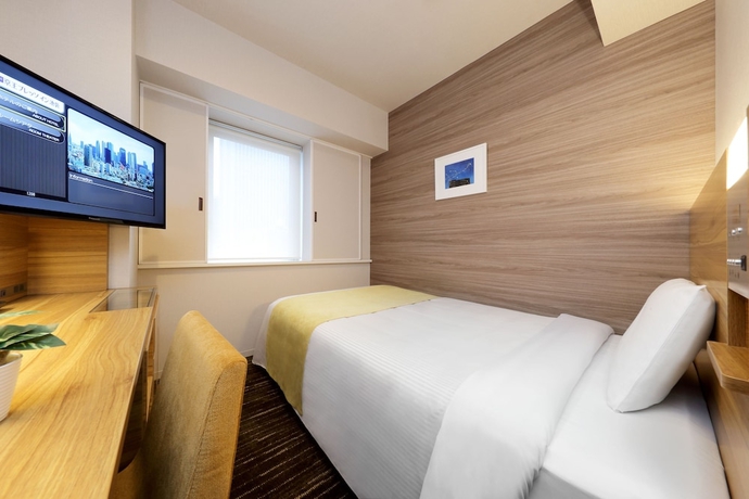 Imagen de la habitación del Hotel Keio Presso Inn Ikebukuro. Foto 7