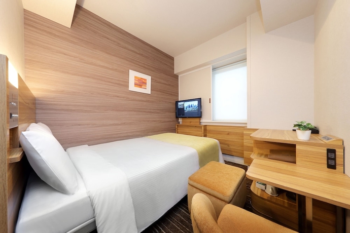 Imagen de la habitación del Hotel Keio Presso Inn Ikebukuro. Foto 8
