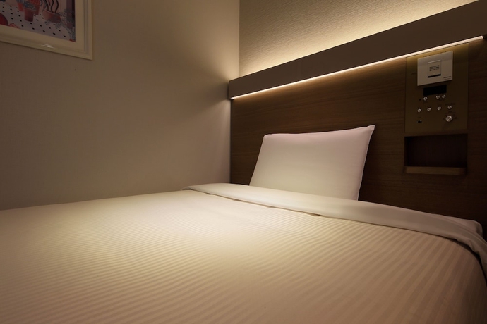 Imagen de la habitación del Hotel Keio Presso Inn Otemachi. Foto 9