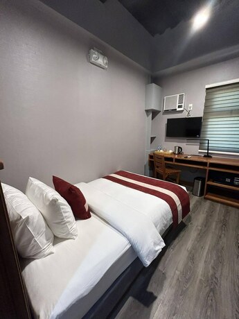 Imagen de la habitación del Hotel Kekehyu Business. Foto 12